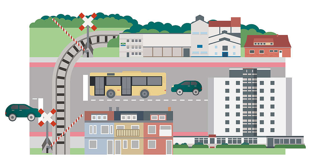 Eine Illustration zeigt einen Bahnübergang auf der Straße mit verschiedenen Fahrzeugen auf der Straße. 